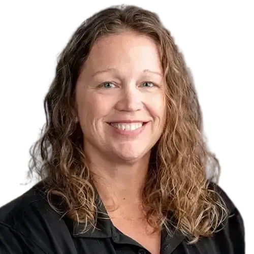 Sara2-transformed A smiling woman in a black shirt who are IT experts managing and maintaining your network and IT investments.