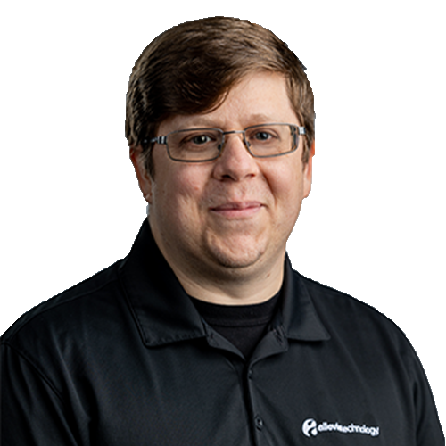 WesleyB_CutOut An IT expert wearing glasses and a black shirt, managing and maintaining your network and IT investments.