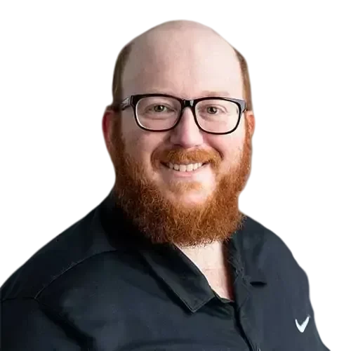 david-transformed An IT expert with glasses is smiling.